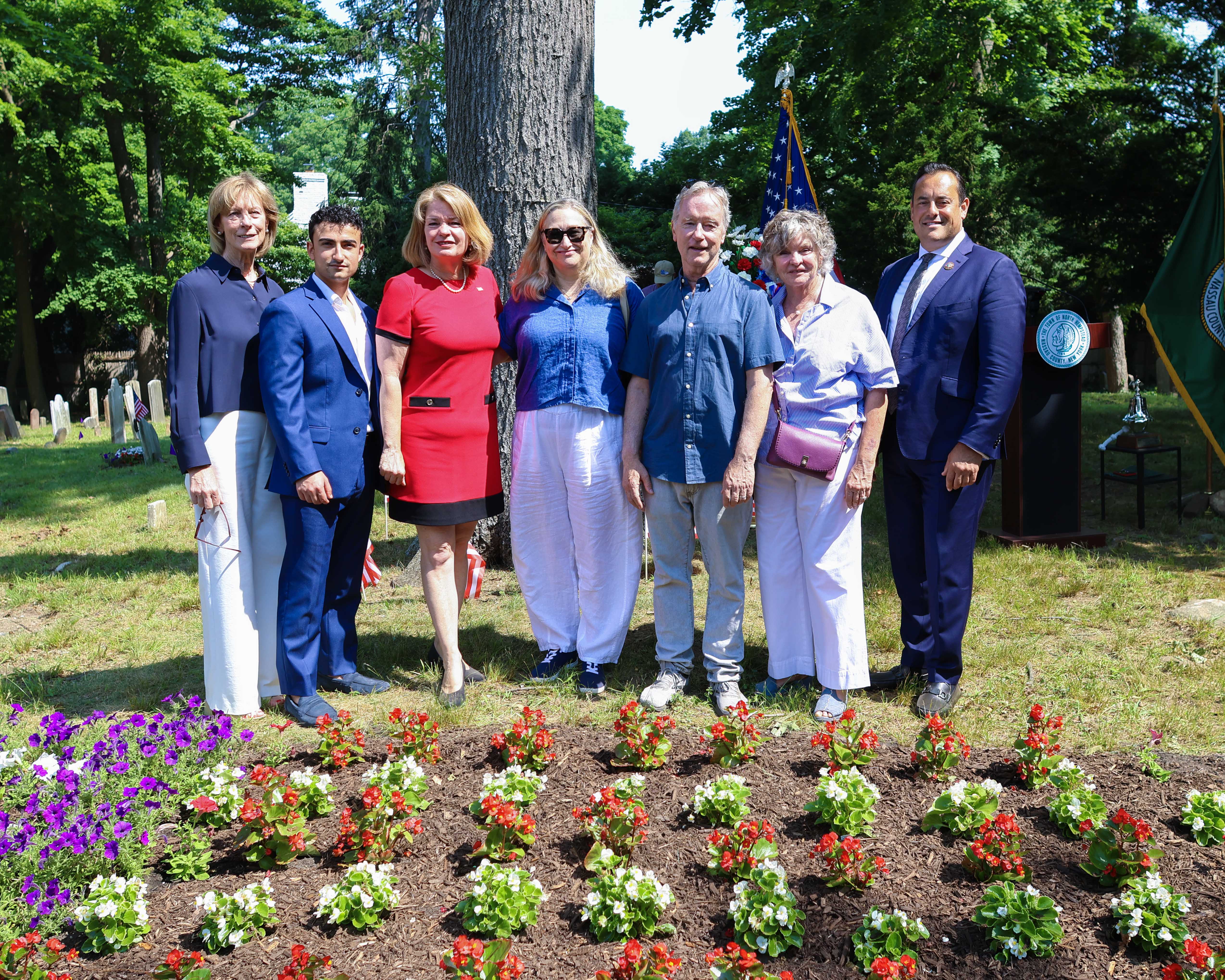 Supervisor DeSena and Town officials and community partners at the June 30 ceremony.